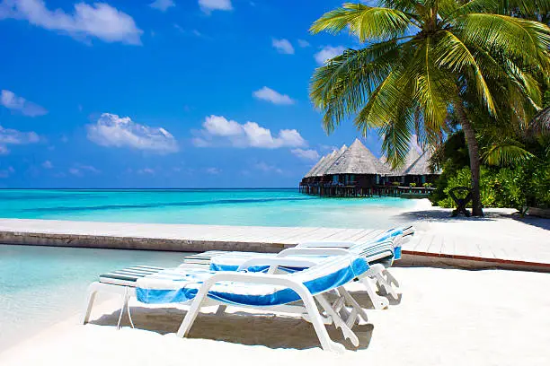 Pair of beach chairs in the Maldives, Randheli Noonu Atoll