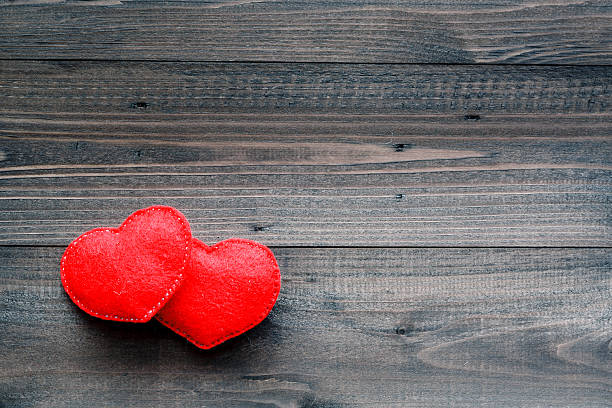 istock Aged wooden background with red heart 505265246