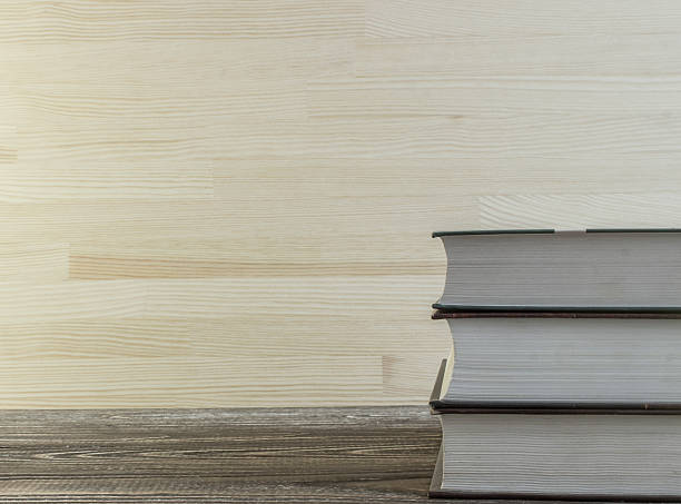istock Books  on a wooden table 505266948