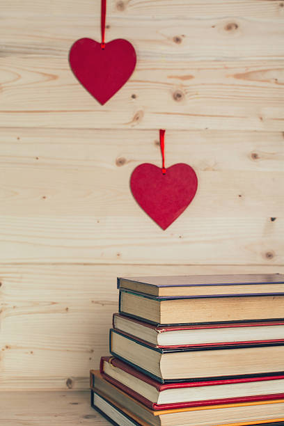 istock Pile of books and hearts 505270176