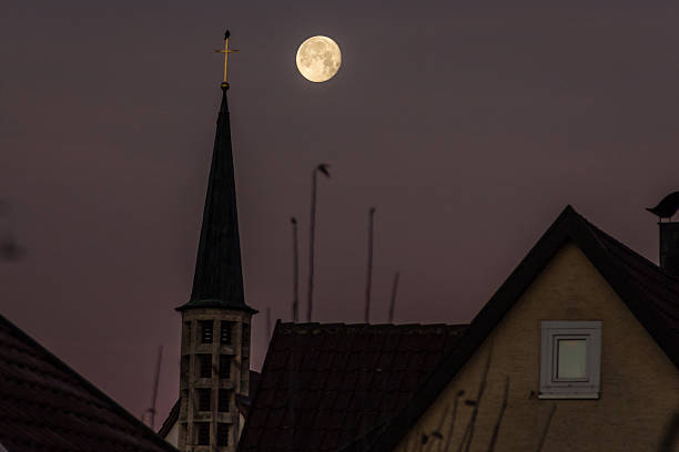 istock Full Moon over a Church 505270238