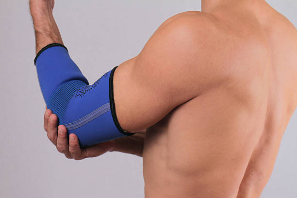 istock Man With Pain In Elbow. Pain relief concept 505272164