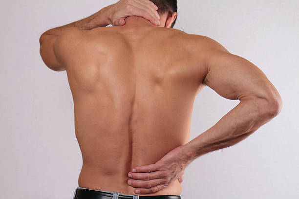 istock Man rubbing his painful back. Pain relief concept 505272290