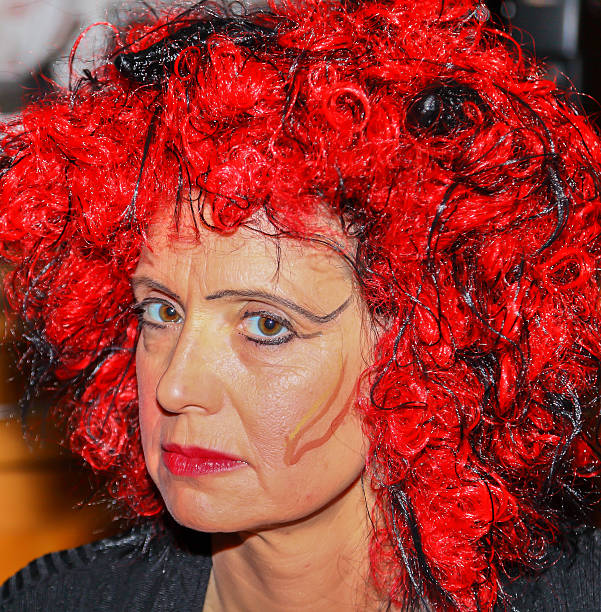 A woman dressed as a witch for Halloween or Carnival