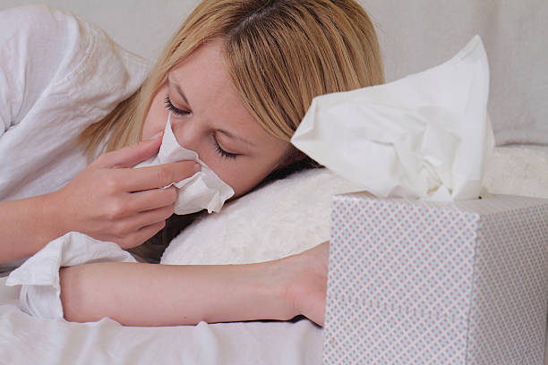 istock Woman caught cold , flue, running nose, selective  focus 505272896