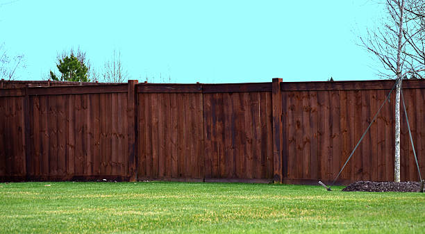 istock Stained Wood Property Fence II 505273524