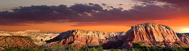 Sunset at Ghost Ranch Late afternoon in the Red Rocks area of Northern New Mexico featuring amazing colors and rock formations new mexico stock pictures, royalty-free photos & images