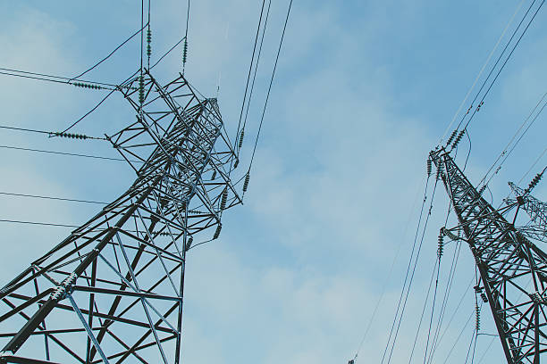 istock Big frosty power lines among winter. 505274074