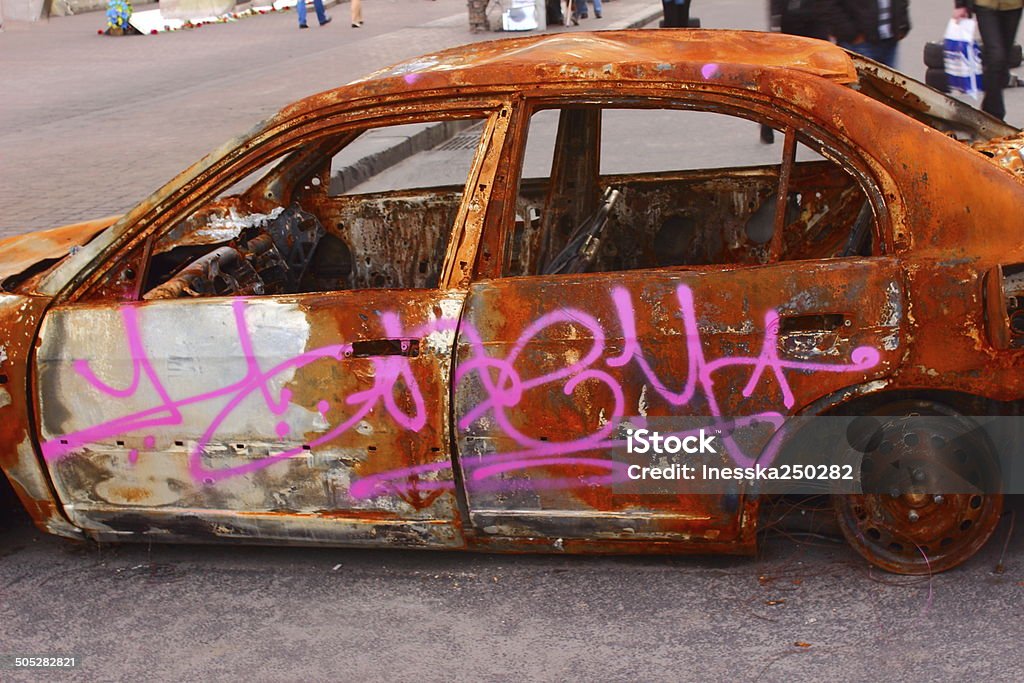 kind of rusty machine closeup on Independence Square in Kiev is destroyed car Car Stock Photo
