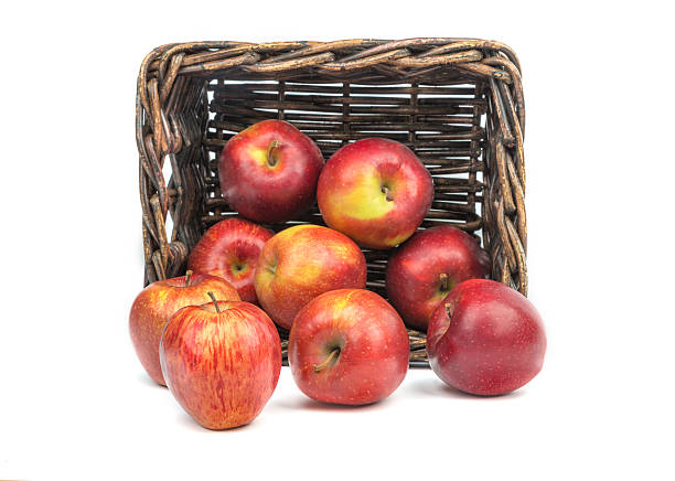 istock Apples on the background of an old basket 505285881