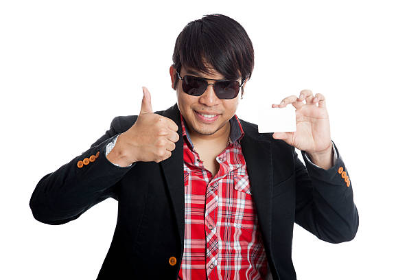 istock Asian man thumbs up with a card 505287985
