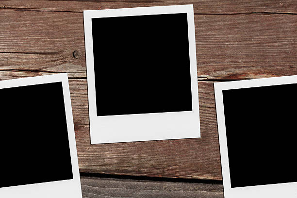 istock Blank Photo Frames On The Wood. 505288091
