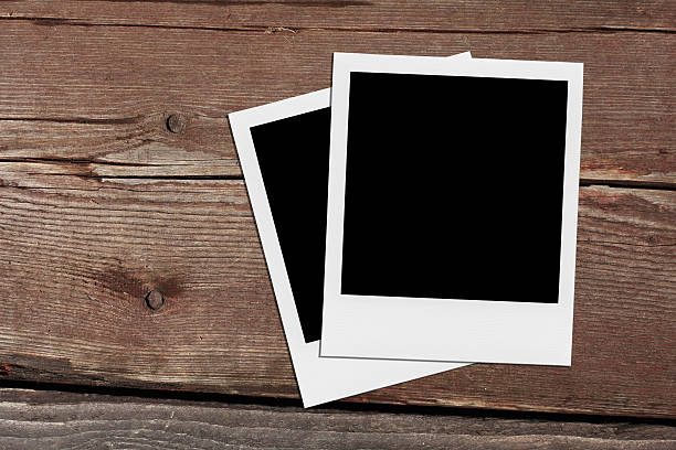 istock Blank Photo Frames On The Wood. 505288093