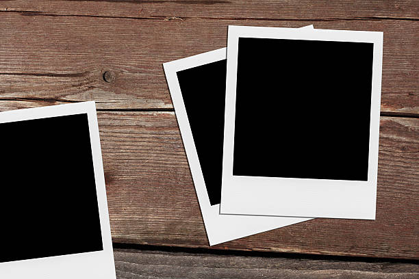 istock Blank Photo Frames On The Wood. 505288367