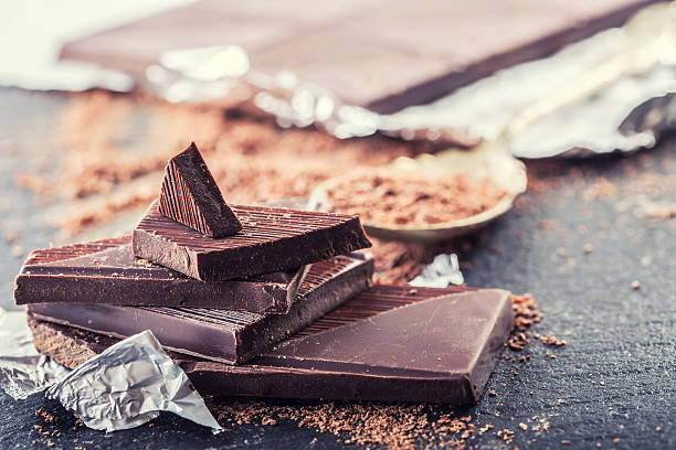 istock Chocolate. Black chocolate. A few cubes of black chocolate. 505289292