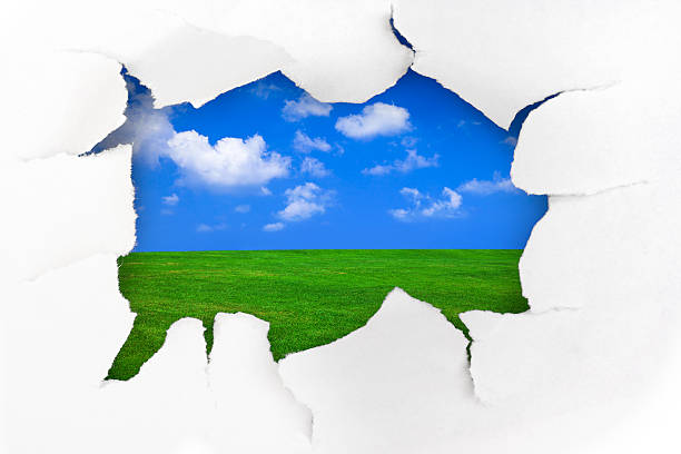 istock Paper hole and summer landscape 505292034
