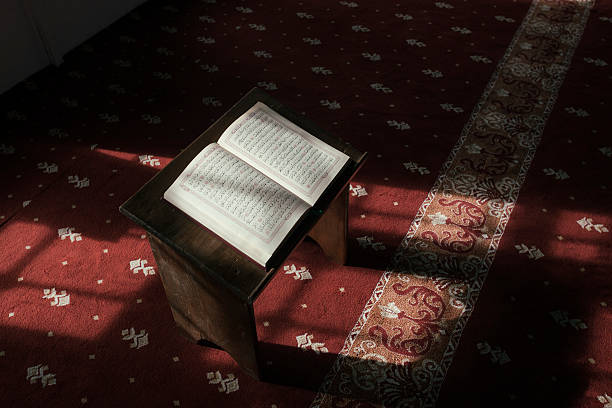 istock Koran On Lectern In Mosque 505292602