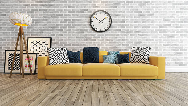 living room with big watch white brick wall living room or saloon interior design with big wall yellow seat or sofa and picture frames watch 3d rendering grey hair on floor stock pictures, royalty-free photos & images