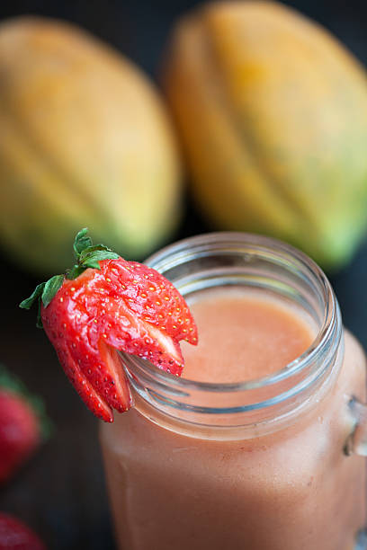 istock Papaya Strawberry Banana Smoothie 505296046