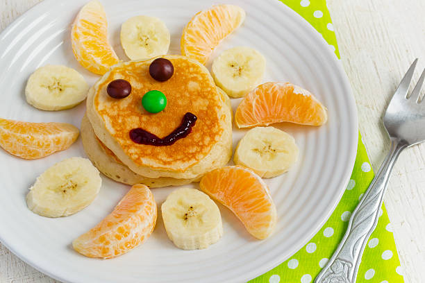 istock Pancakes with fruit and jam for the children. Breakfast concept 505301388