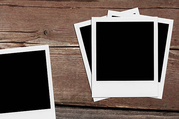 istock Blank Photo Frames On The Wood. 505301685