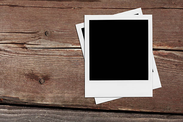 istock Blank Photo Frames On The Wood. 505301687