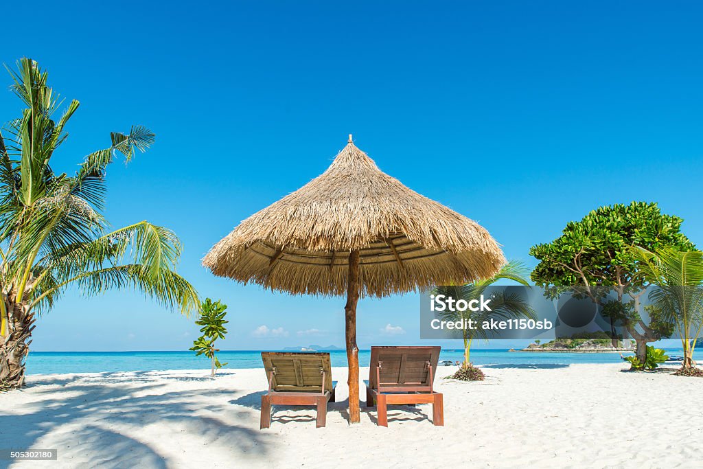 Beach Chairs and Umbrella on island in Phuket, Thailand Summer, Travel, Vacation and Holiday concept - Beach Chairs and Umbrella on island in Phuket, Thailand Hawaii Islands Stock Photo