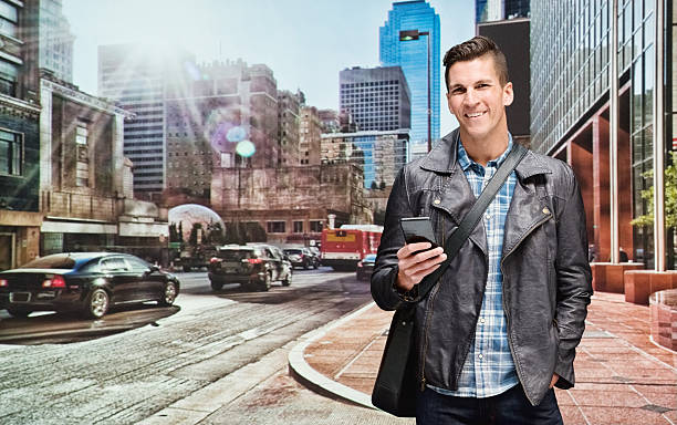 istock Smiling casual man using mobile outdoors 505302708
