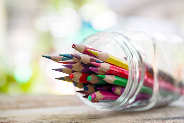istock Glass jar containing colored pencils seen from above 505304704