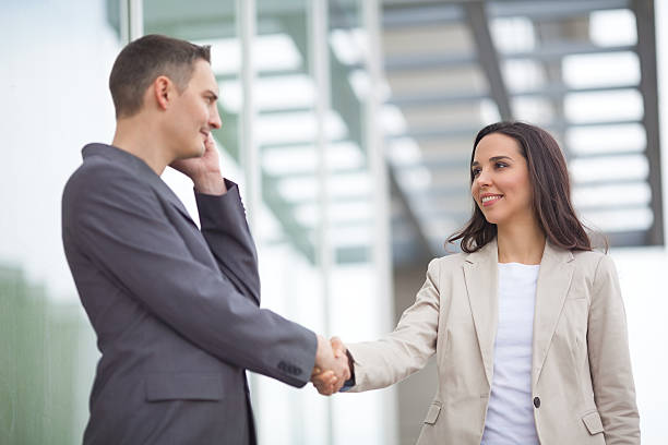 istock Business People Handshaking 505305728