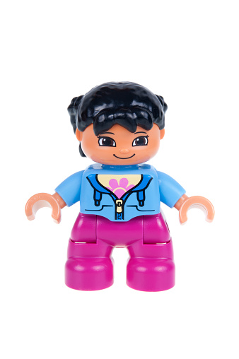 Adelaide, Australia - December 27, 2015: A studio shot of a Girl Lego duplo minifigure. Lego Duplo is desinged for younger children with larger blocks and figures. Lego is extremely popular worldwide with children and collectors.