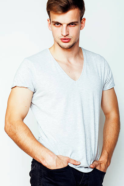 istock young handsome man on white background gesturing, pointing, posing emotional 505333138
