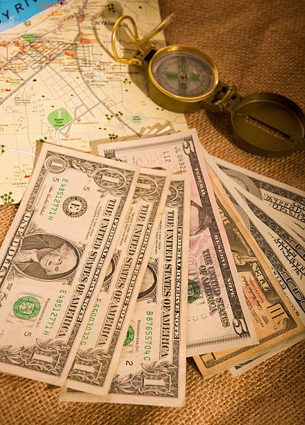 istock traveling with US dollars 505336804