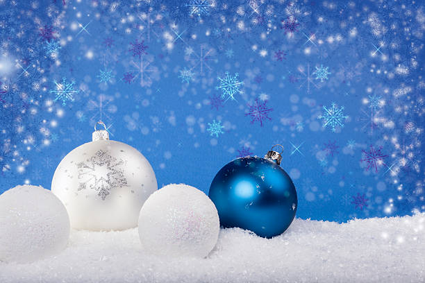 istock Blue Christmas balls in the snow 505336974