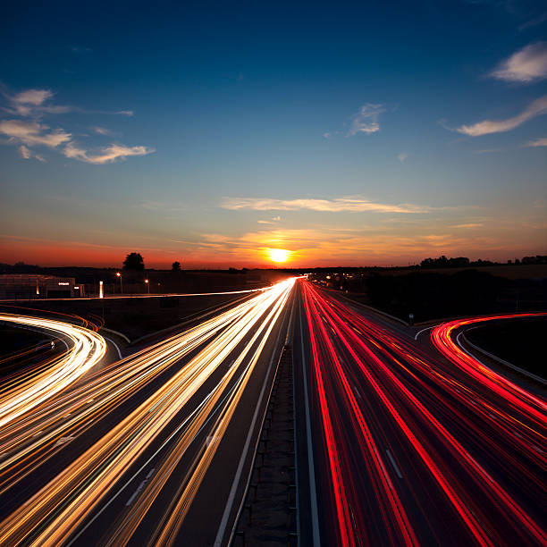 istock Speed Traffic  long exposure on motorway highway at sundown 505339204