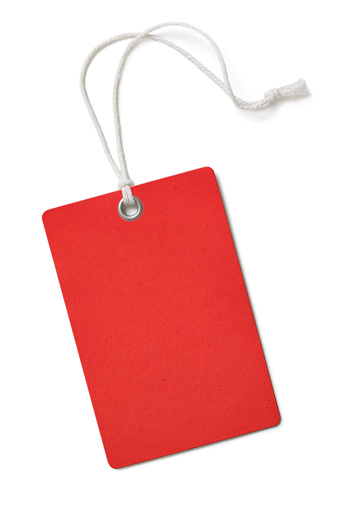 Red paper price or sale tag isolated on white