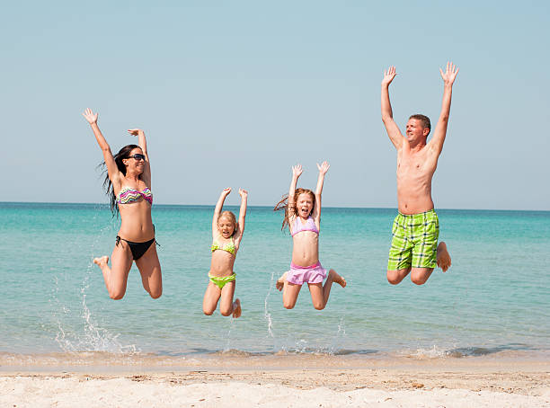 istock Family at the beach 505364855