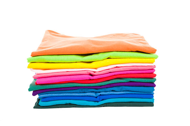 istock Pile of colorful clothes with white background 505366573