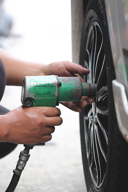 istock mechanic repaired wheeled vehicles. 505369273