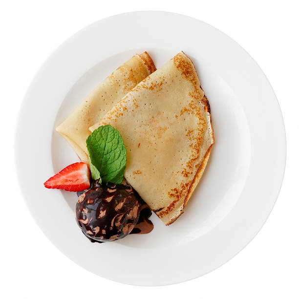 istock Pancakes with chocolate ice cream isolated on white 505370105