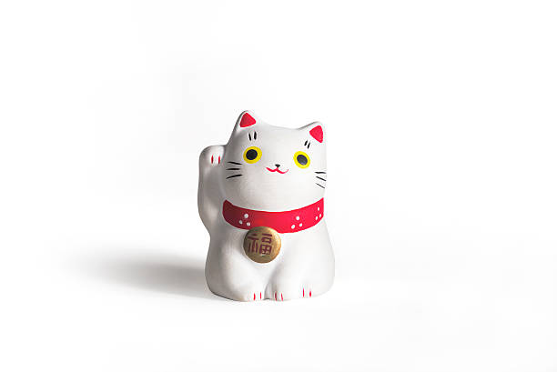 招き猫—日本の心地よい猫 - 招き猫 ストックフォトと画像