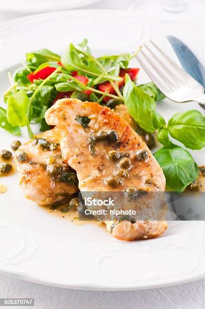 Chicken Piccata With Capern And Salad Stock Photo - Download Image Now - Italian Culture, Arugula, Basil