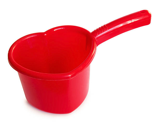 istock Red plastic scoop  in the form of heart 505371038