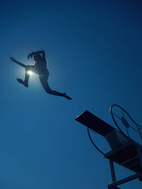 女の子の海でのダイビング - men child swimming pool women ストックフォトと画像