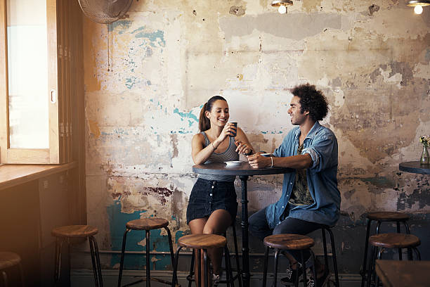 Their first date was so good they kept coming back Shot of a young couple having a coffee date at a cafehttp://195.154.178.81/DATA/i_collage/pu/shoots/806208.jpg couple drinking stock pictures, royalty-free photos & images