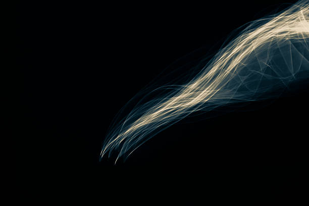 istock Glowing abstract curved blue and yellow lines 505379896