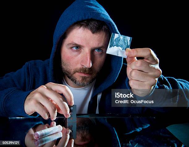 Depressed Sick Looking Cocaine Addict Man Sniffing Coke Stock Photo - Download Image Now