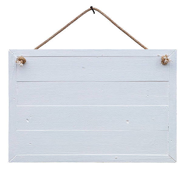 istock Old weathered white wood signboard. 505395795