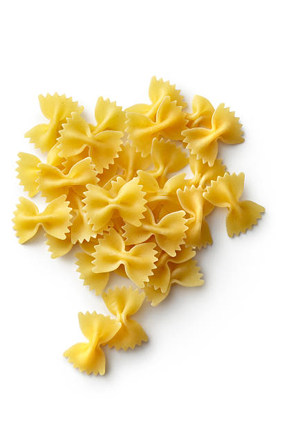 ingredienti italiani: farfalle - italian cuisine dry pasta directly above foto e immagini stock
