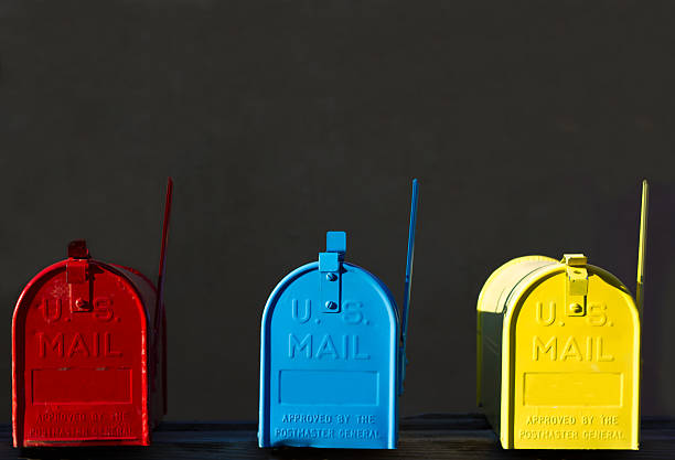 istock Colorful Mailboxes in Morning Sun, Flags Up 505396353